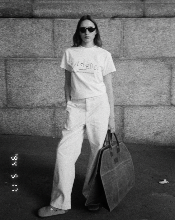 Unisex white 'Evidence' t-shirt by 10:AM Factory, featuring a minimalist graphic design and bold 10:AM logo, crafted from high-quality, soft cotton for a clean, modern look.