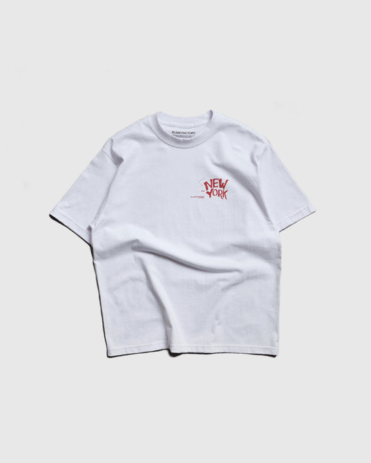 White heavyweight tee with dark red handwritten New York print, front view.