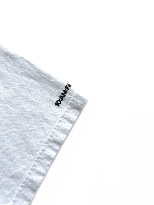 Unisex white 'What Would Hamlet Do?' heavy t-shirt by 10:AM Factory, featuring bold puff graphic print and 10:AM logo, crafted from 100% pigment-dyed cotton for a vintage look.