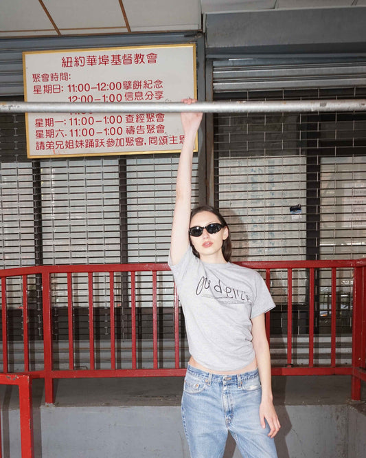 Unisex lightweight grey 'Evidence' t-shirt by 10:AM Factory, featuring a minimalist graphic design and bold 10:AM logo, crafted from high-quality, soft cotton for a clean, modern look.