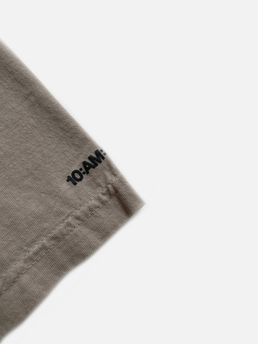 Unisex light brown 'What Would Hamlet Do?' Shroom heavy t-shirt by 10:AM Factory, featuring bold puff graphic print and 10:AM logo, crafted from 100% pigment-dyed cotton for a vintage look.