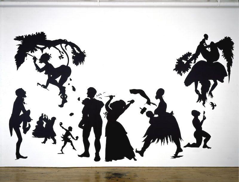 Kara Walker murals depicting powerful historic narratives through provocative silhouette art installations