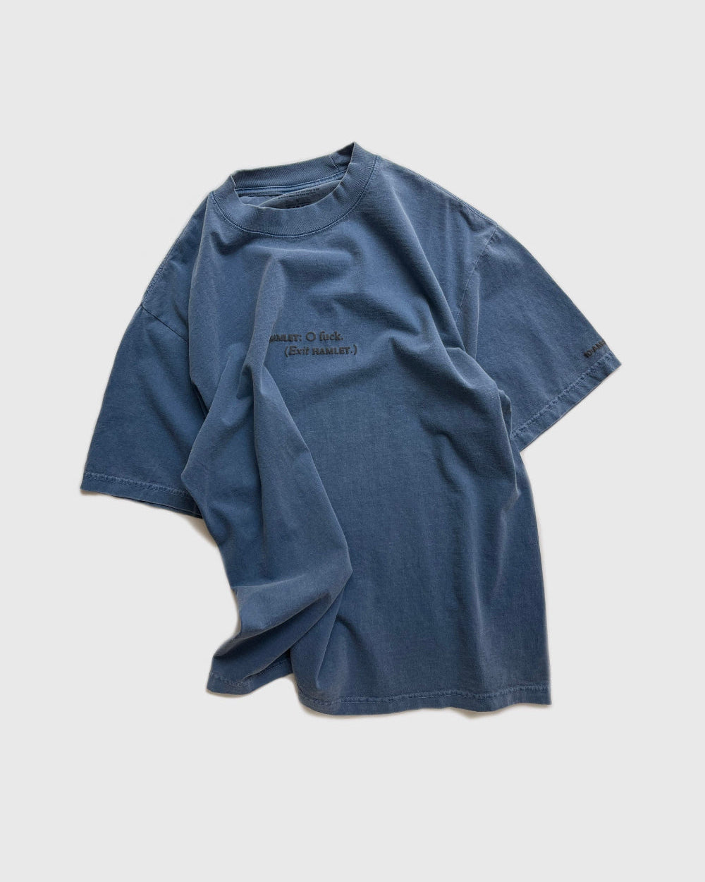 Unisex blue 'What Would Hamlet Do?' heavy t-shirt by 10:AM Factory, featuring bold puff graphic print and 10:AM logo, crafted from 100% pigment-dyed cotton for a vintage look.