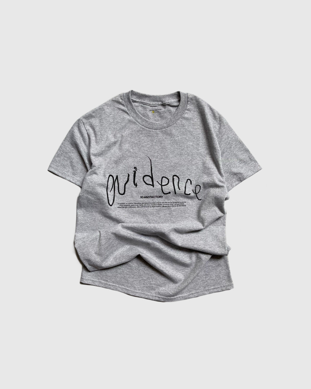 Unisex lightweight grey 'Evidence' t-shirt by 10:AM Factory, featuring a minimalist graphic design and bold 10:AM logo, crafted from high-quality, soft cotton for a clean, modern look.