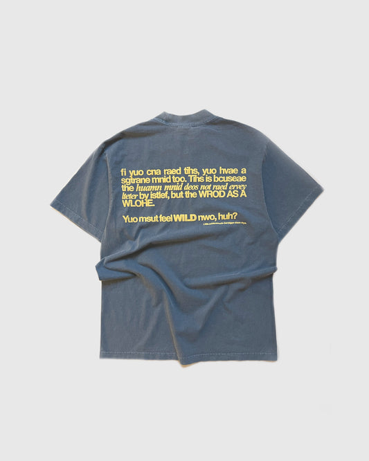 Unisex blue 'Strange Mind' heavyweight t-shirt by 10:AM Factory, featuring bold graphic print with 10:AM logo, crafted from high-quality, pigment-dyed cotton for a vintage look