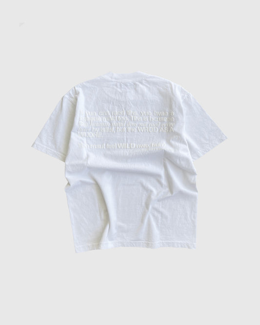 Unisex white 'Strange Mind' heavyweight t-shirt by 10:AM Factory, featuring a subtle white puff graphic print, crafted from high-quality, pigment-dyed cotton for a minimalist and timeless look.