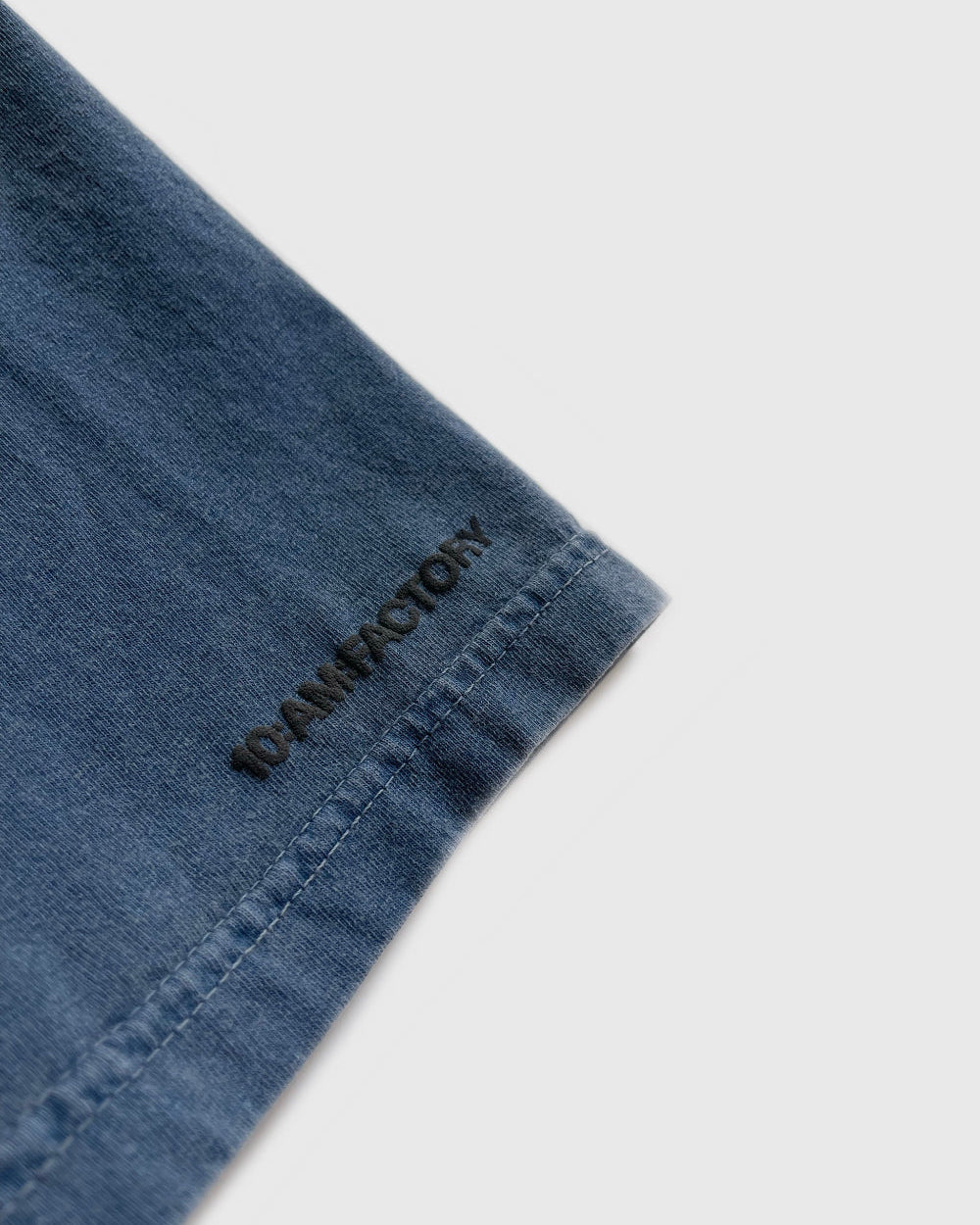 Unisex blue 'What Would Hamlet Do?' heavy t-shirt by 10:AM Factory, featuring bold puff graphic print and 10:AM logo, crafted from 100% pigment-dyed cotton for a vintage look.