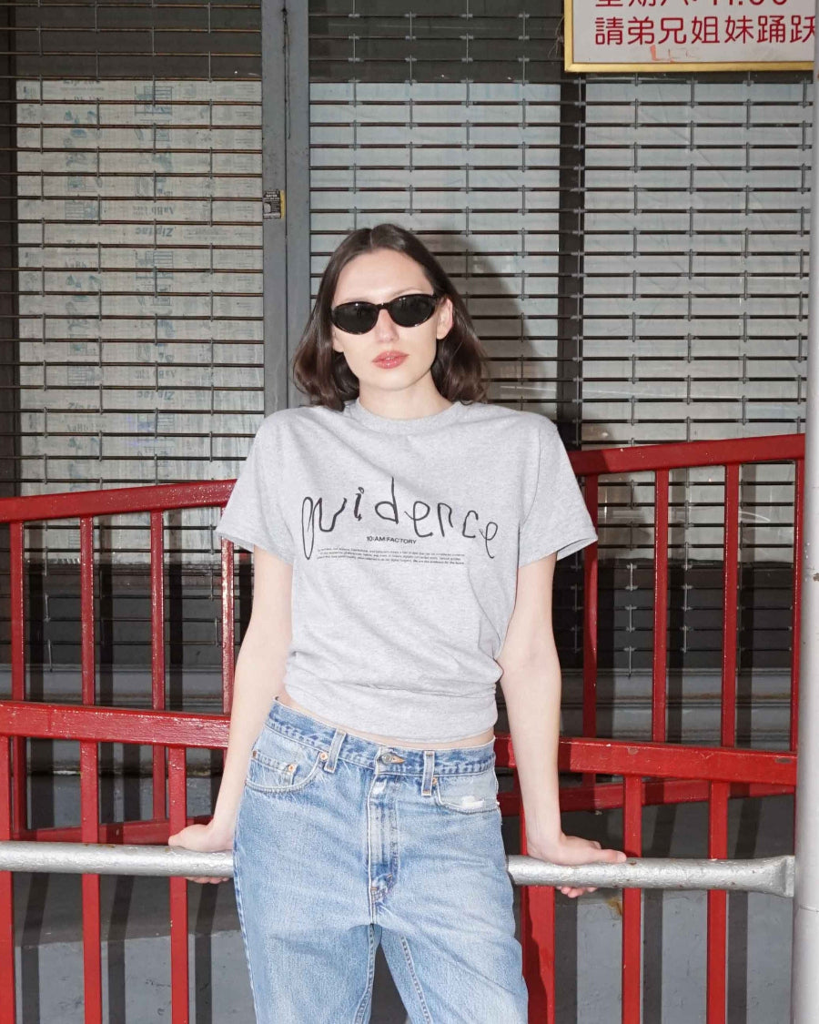 Unisex lightweight grey 'Evidence' t-shirt by 10:AM Factory, featuring a minimalist graphic design and bold 10:AM logo, crafted from high-quality, soft cotton for a clean, modern look.