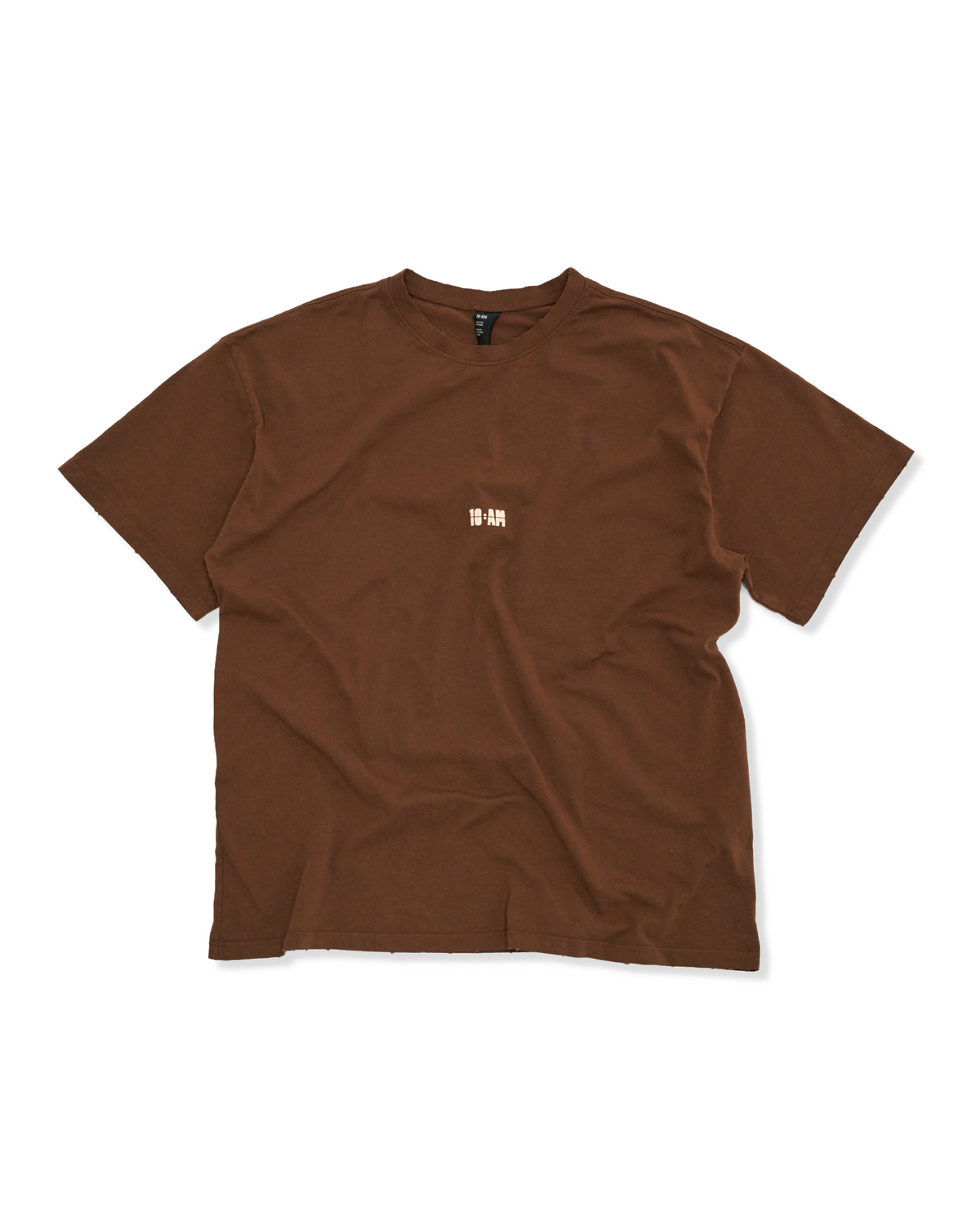 Unisex brown oversized t-shirt by 10:AM Factory, featuring the bold 'Sun Smells Different These Days' graphic print, crafted from high-quality, soft cotton for a relaxed, modern fit.