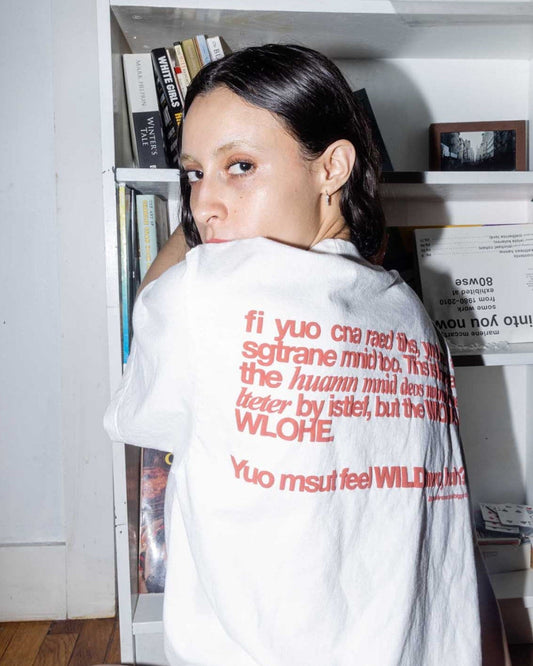 Unisex white 'Strange Mind' heavyweight t-shirt by 10:AM Factory, featuring a bold red puff graphic print with 10:AM logo, crafted from high-quality, pigment-dyed cotton for a modern, vintage look