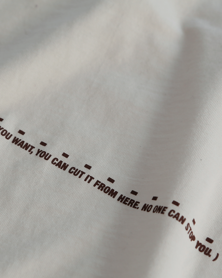 Unisex off-white 'Fear of What' oversized t-shirt by 10:AM Factory, featuring bold graphic print and 10:AM logo, crafted from high-quality, soft cotton for a modern, comfortable fit.
