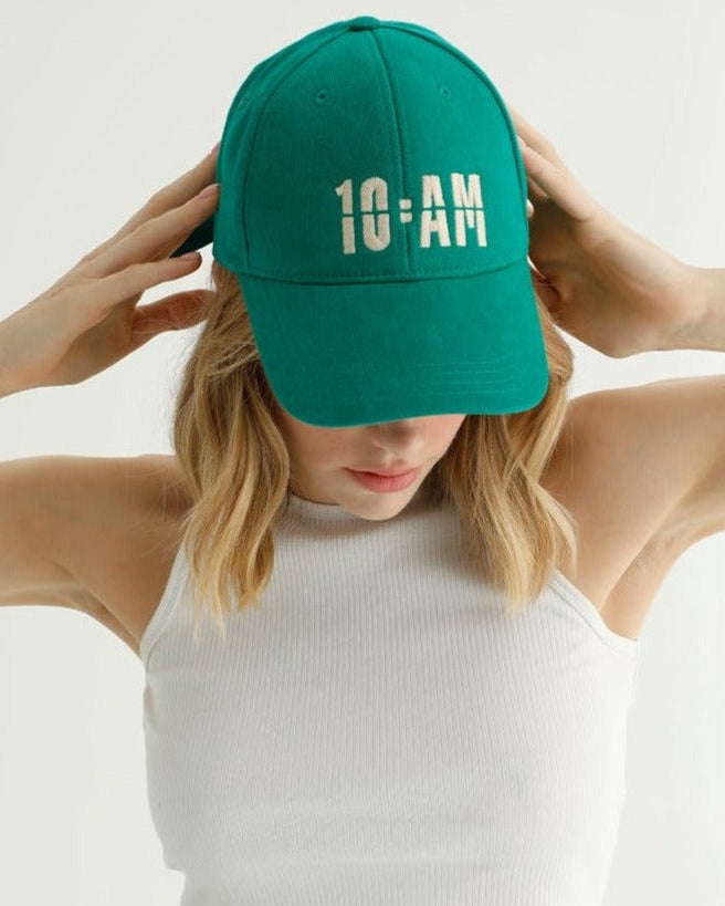 Green Cap with 10amfactory logo, stylish and eco-friendly headwear perfect for everyday use